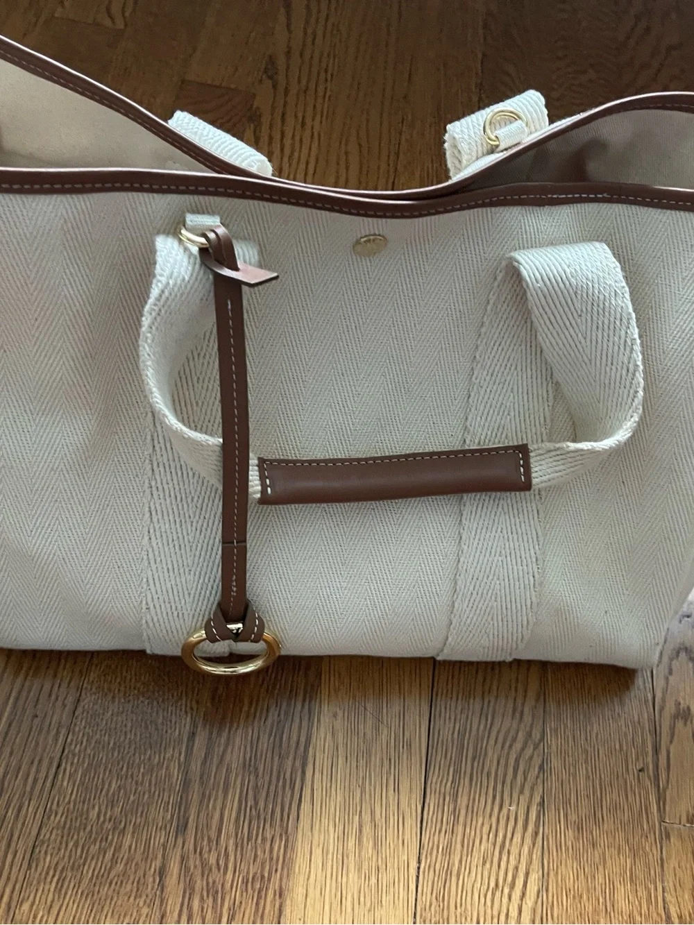 Cream Canvas Tote with Brown Trim and Gold Ring Accent